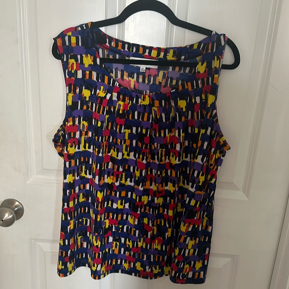 Sleeveless multi colored blouse 
Bright colors